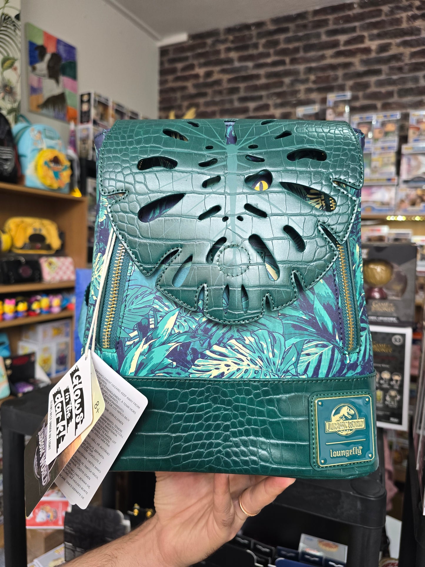 Loungefly - Jurassic World Jungle Velociraptor Glow Drawstring Mini Backpack
